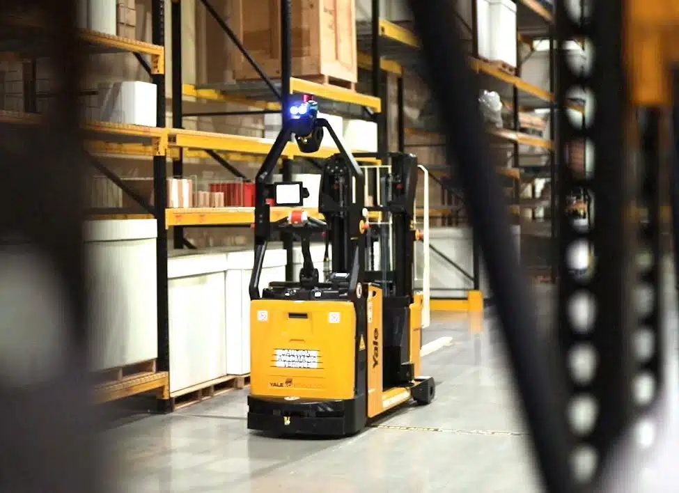 Robotic Forklift Moves Through Warehouse Without Operator